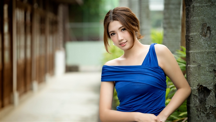 Smiling Asian Woman in Blue Dress 4K