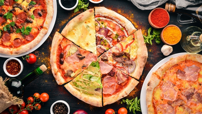 Delicious Variety of Pizza Slices in 4K