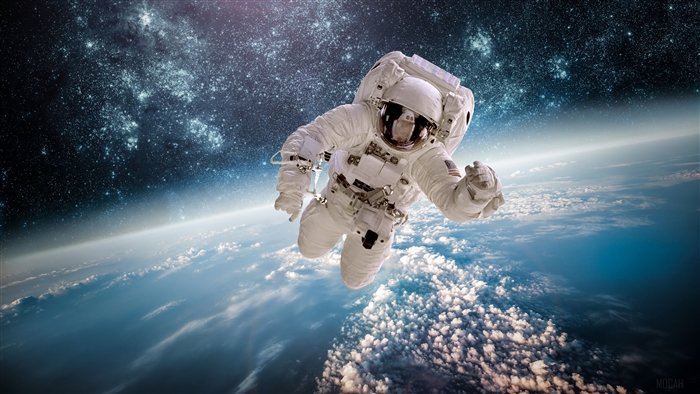 Astronaut floating above Earth with stars in background