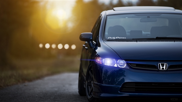 Dark Blue Honda Civic with "Daily Driven" Banner