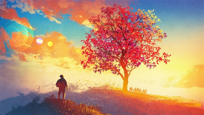 Man and tree with colorful leaves at sunset