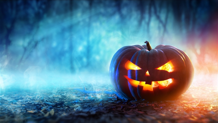 Scary Jack-o'-lantern in a foggy forest 4K