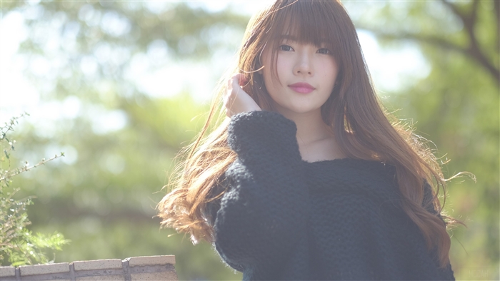 Young woman with long brown hair