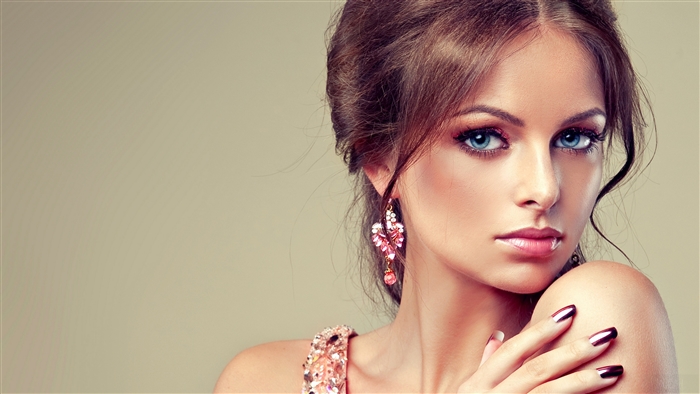 Elegant Woman with Blue Eyes and Pink Earrings 4K