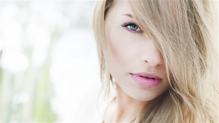 Close-up of a blonde woman's face