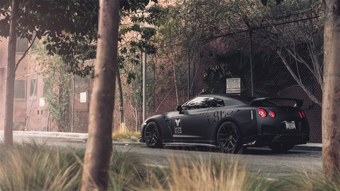 Black Nissan GT-R with custom decals