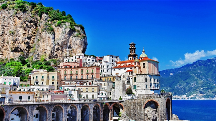 Amalfi Coast town with colorful buildings and sea