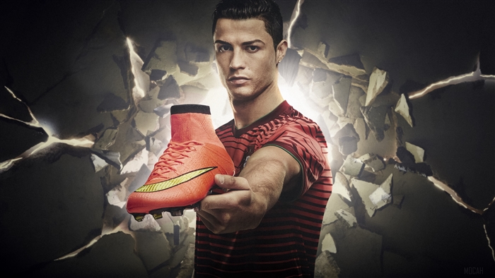 Cristiano Ronaldo Holding Bright Orange Soccer Cleat 4K