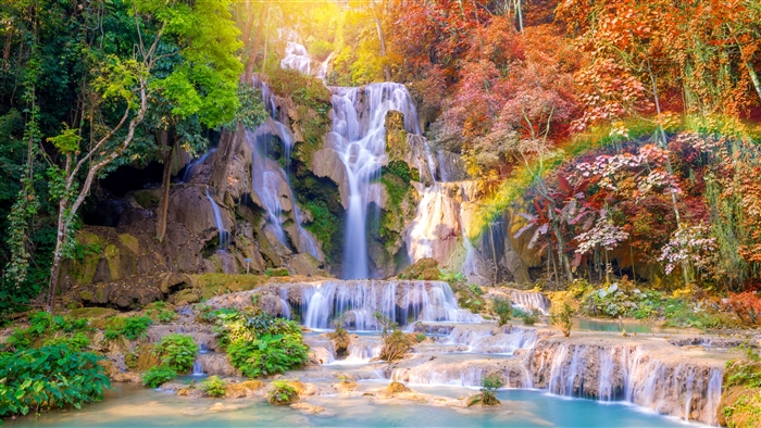 Serene Waterfall Amidst Vibrant Fall Foliage 4K