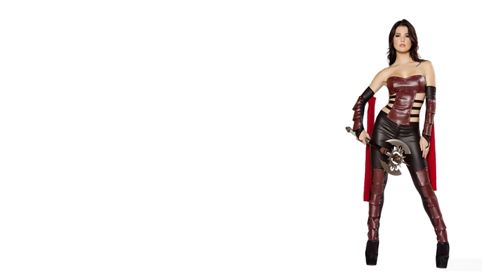 Woman in warrior costume holding an axe