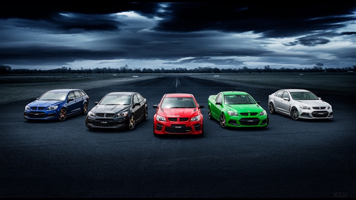 Holden Cars Lined Up on a Racetrack