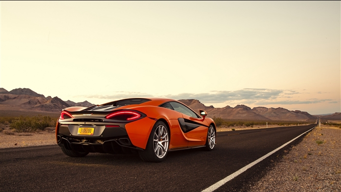 Orange McLaren 570S Supercar on Desert Road 4K
