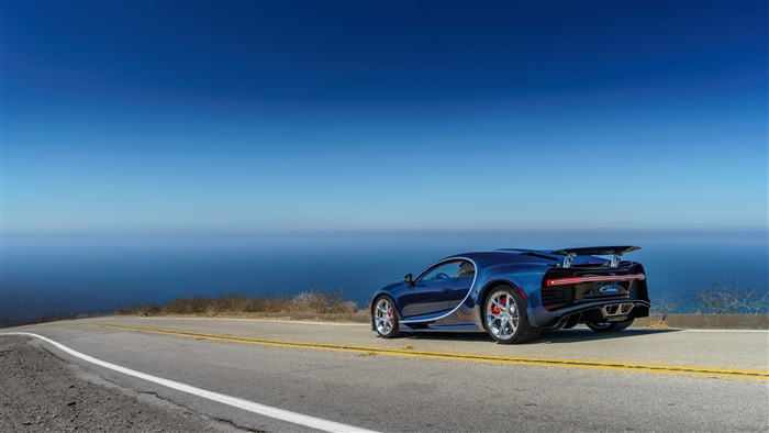 Blue Bugatti Chiron Sportscar on Coastal Road 4K