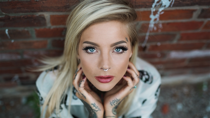 Blonde Woman with Blue Eyes and Tattoos 4K