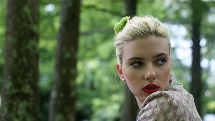 Scarlett Johansson in a forest setting