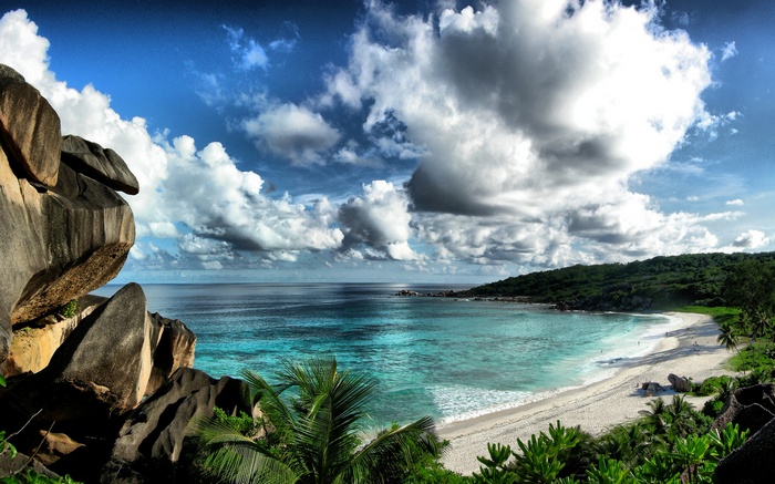 Tropical beach with granite boulders and turquoise ocean