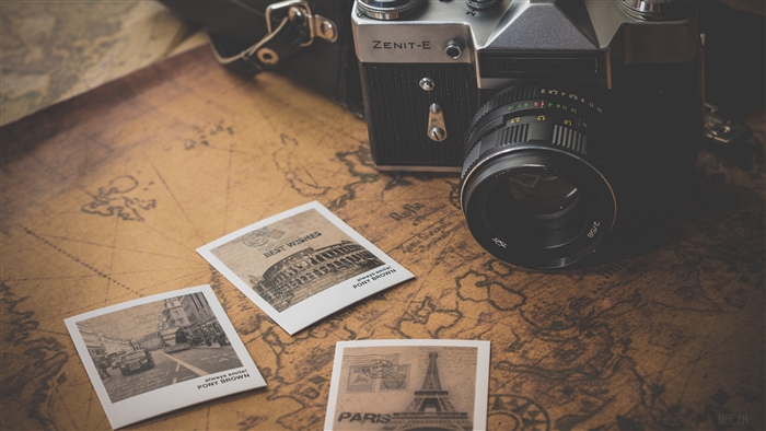 Vintage Zenit-E Camera with Retro Map and Photos