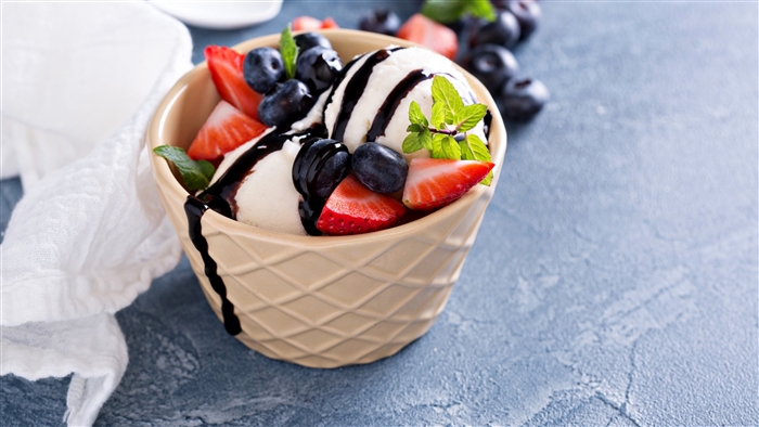 Ice cream with strawberries and blueberries