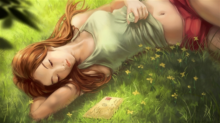 Girl lying in grass with letter