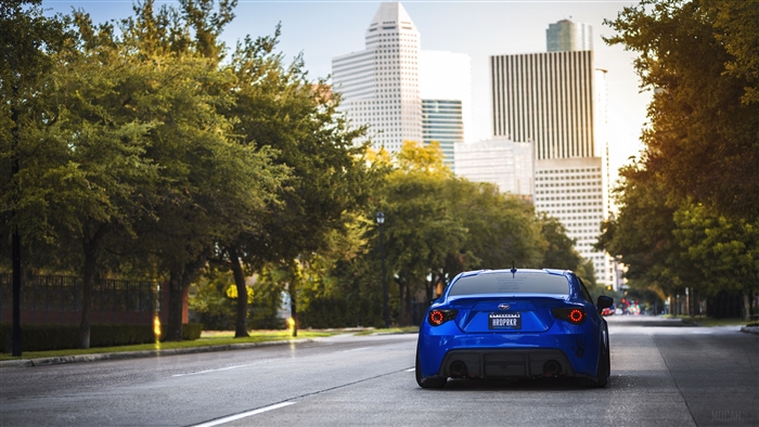 Blue Subaru BRZ on a City Street