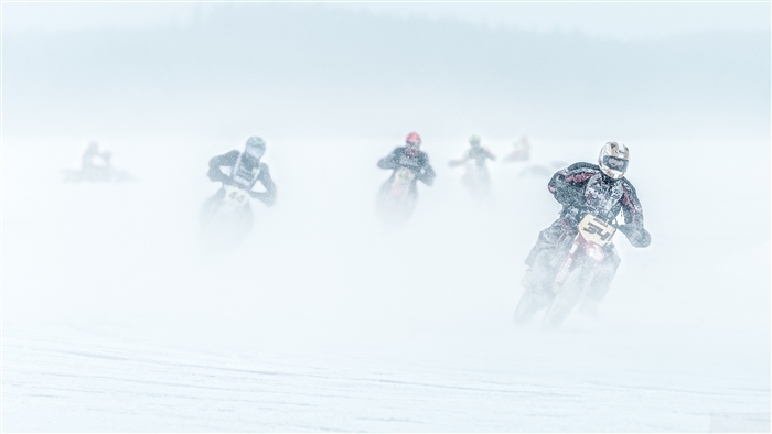 Motorcycle race in snowstorm 4K