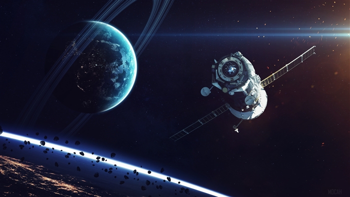 Spacecraft near a ringed planet and asteroid belt