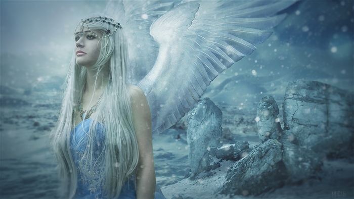Angel with white hair in a snowy landscape