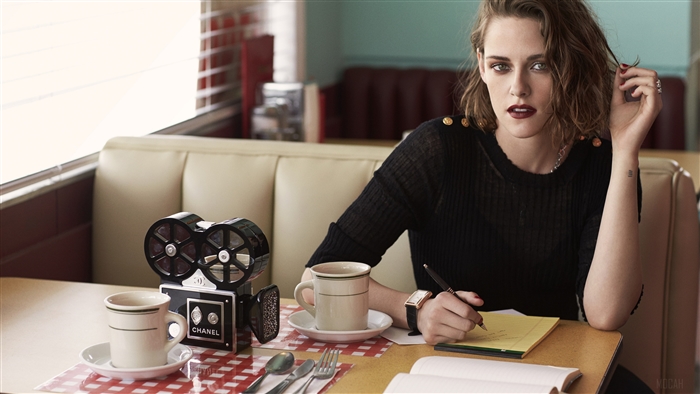 Kristen Stewart in a diner with Chanel camera