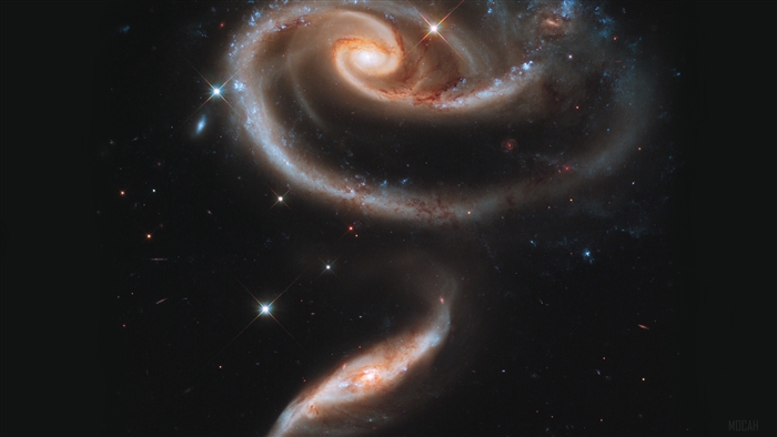 Two interacting spiral galaxies in space