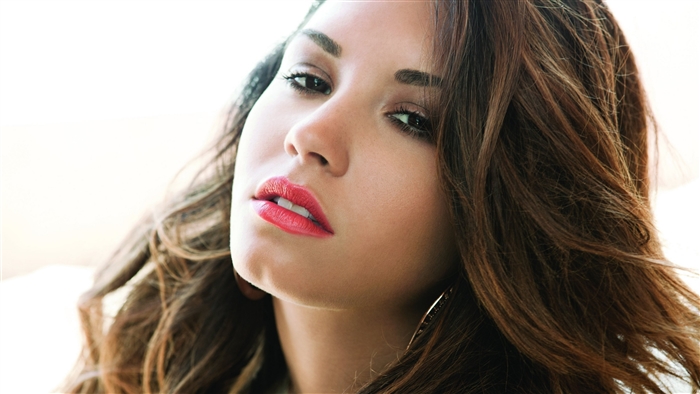 Close-up of a woman with red lipstick