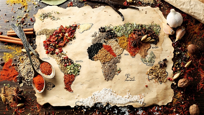World map made of spices on parchment