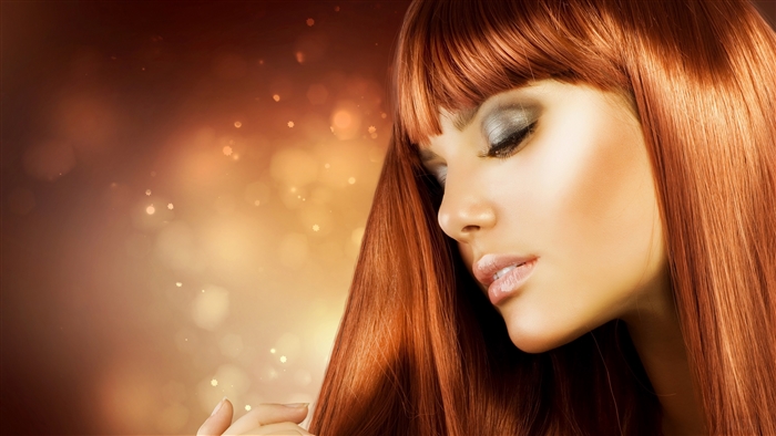 Woman with red hair and makeup