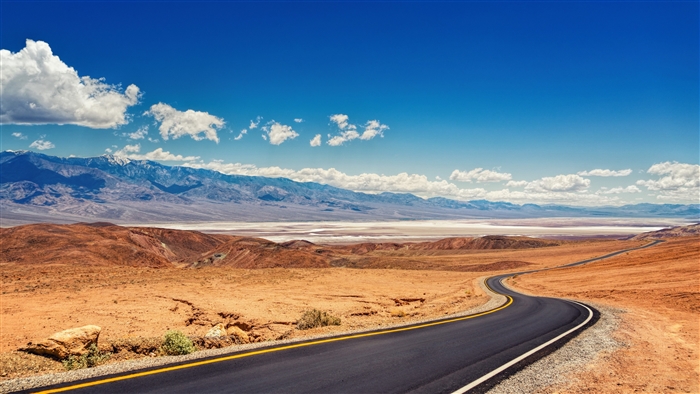 Desert Landscape with Winding Road and Mountains 4K