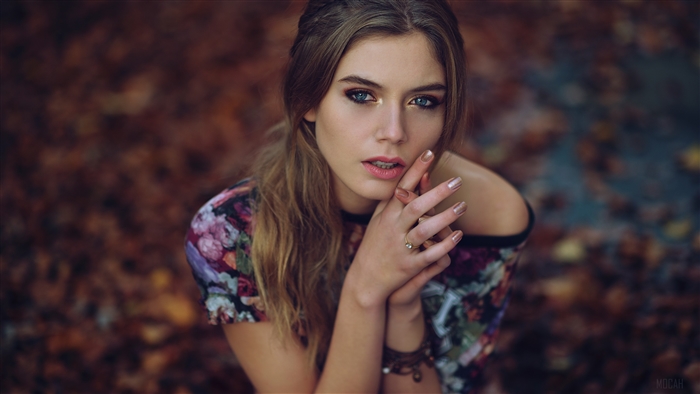 Woman with blue eyes and floral top 4K