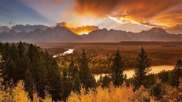 Sunrise over Mountains and River with Fall Forest
