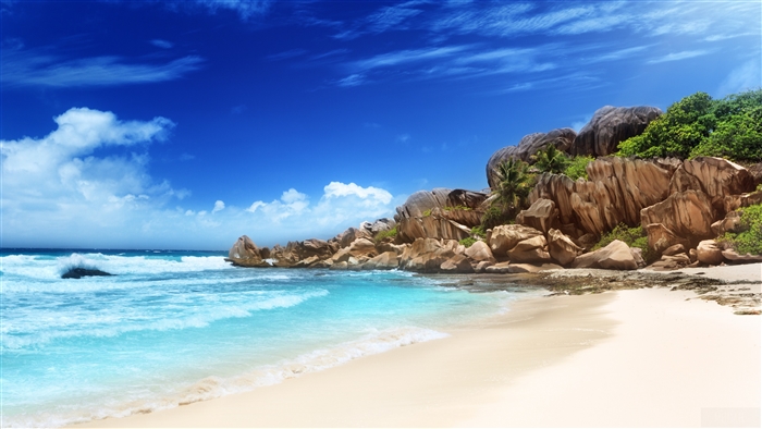 Tropical beach with granite boulders and turquoise water