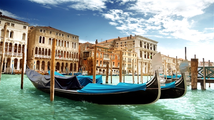 Gondolas on a canal in Venice