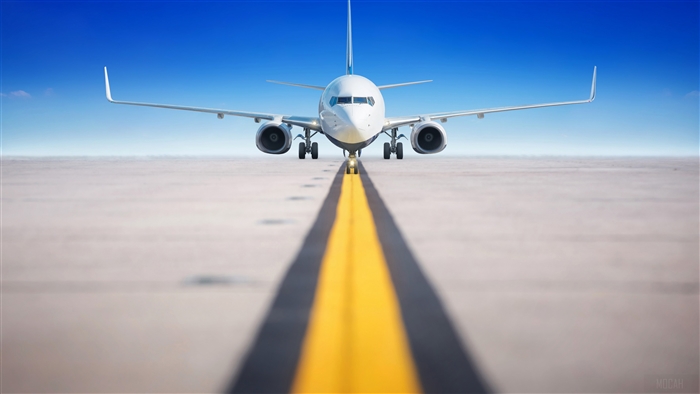 Passenger Plane on Runway in Clear Blue Sky