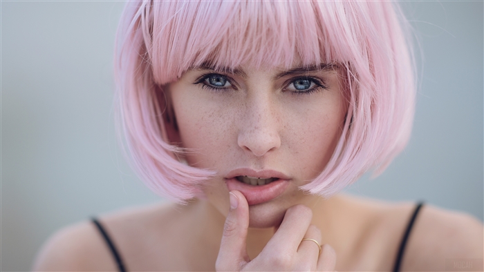 Close-up of Woman with Pink Hair and Blue Eyes 4K