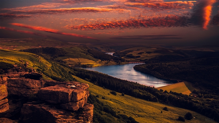 Sunset over a mountain lake landscape 4K