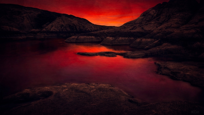 Lake and Rocky Shoreline at Sunset 4K
