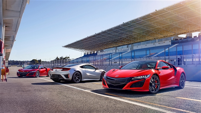 Acura NSX cars on a race track