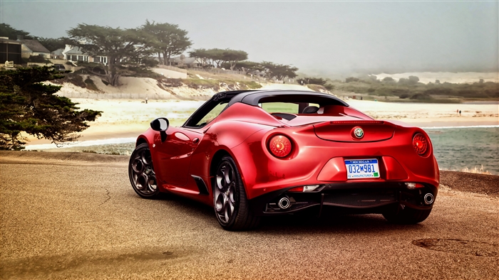 Red Alfa Romeo 4C Spider Convertible by the Beach