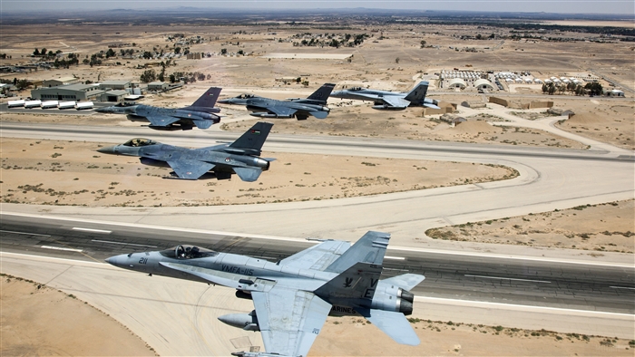 McDonnell Douglas F/A-18 Hornet and F-16 Fighting Falcons in formation