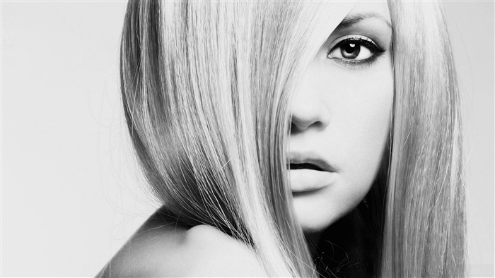 Close-up of a woman's face with blonde hair