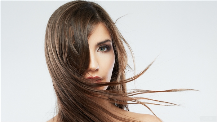 Woman with flowing brown hair