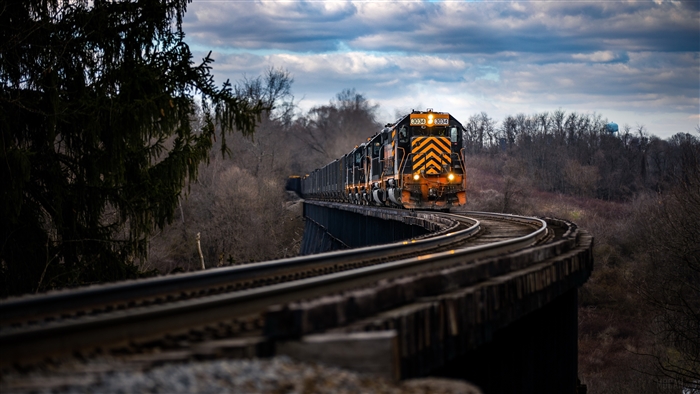 Locomotive Train on Curved Railroad Bridge 4K