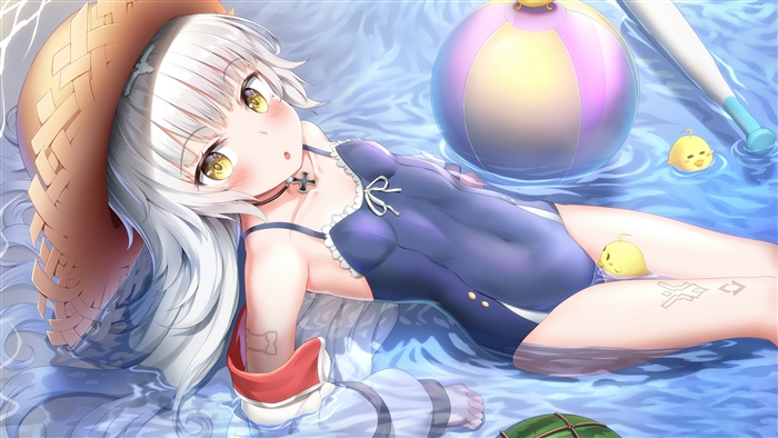 Z46 in a swimsuit with a beach ball