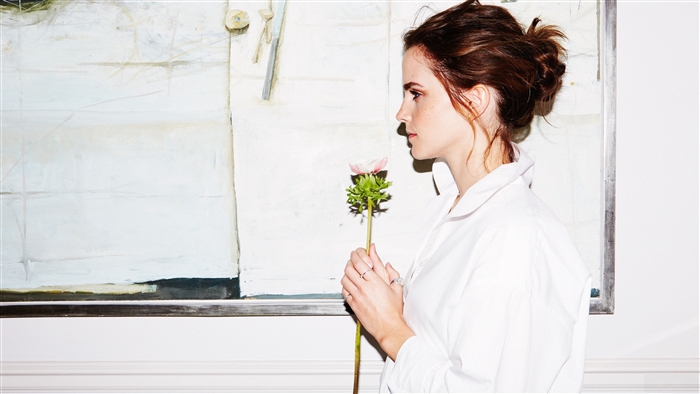 Emma Watson with a flower