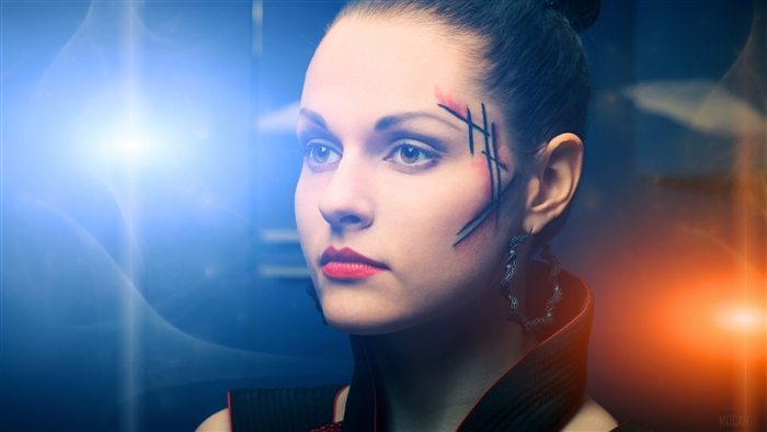 Woman with futuristic makeup and costume
